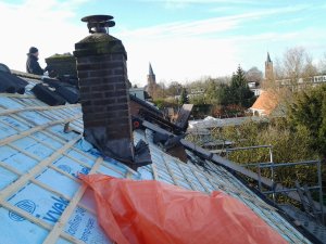 Aanbrengen isolatie en panlatten